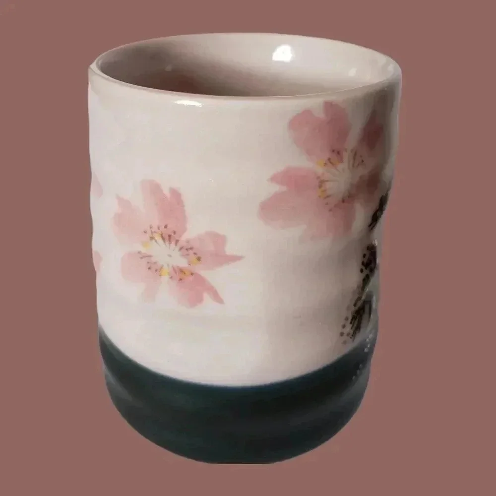 -Tea cup Japanese pottery pink and black